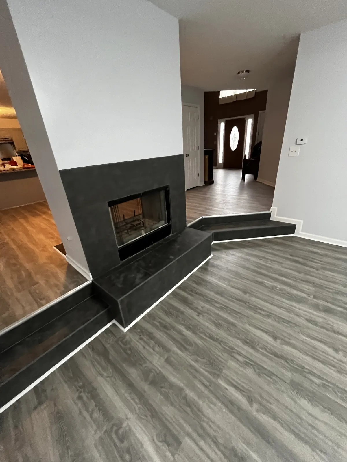 Fireplace & Flooring Refresh, Sandy Springs, GA by ArtScape Builders